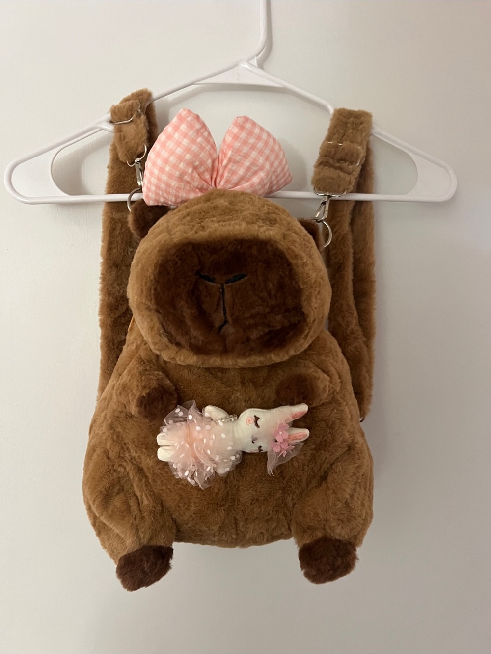 Capybara Plush Backpack with Pink Bow and doll